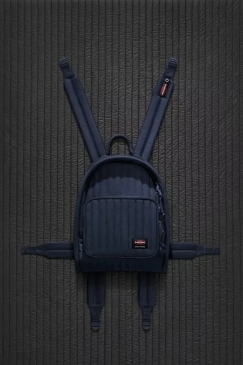 Eastpak Craig Green x Eastpak collection featuring quilted bags in black, khaki and navy with distinctive vertical stitching and modified logo patches. (image 4 of 7)