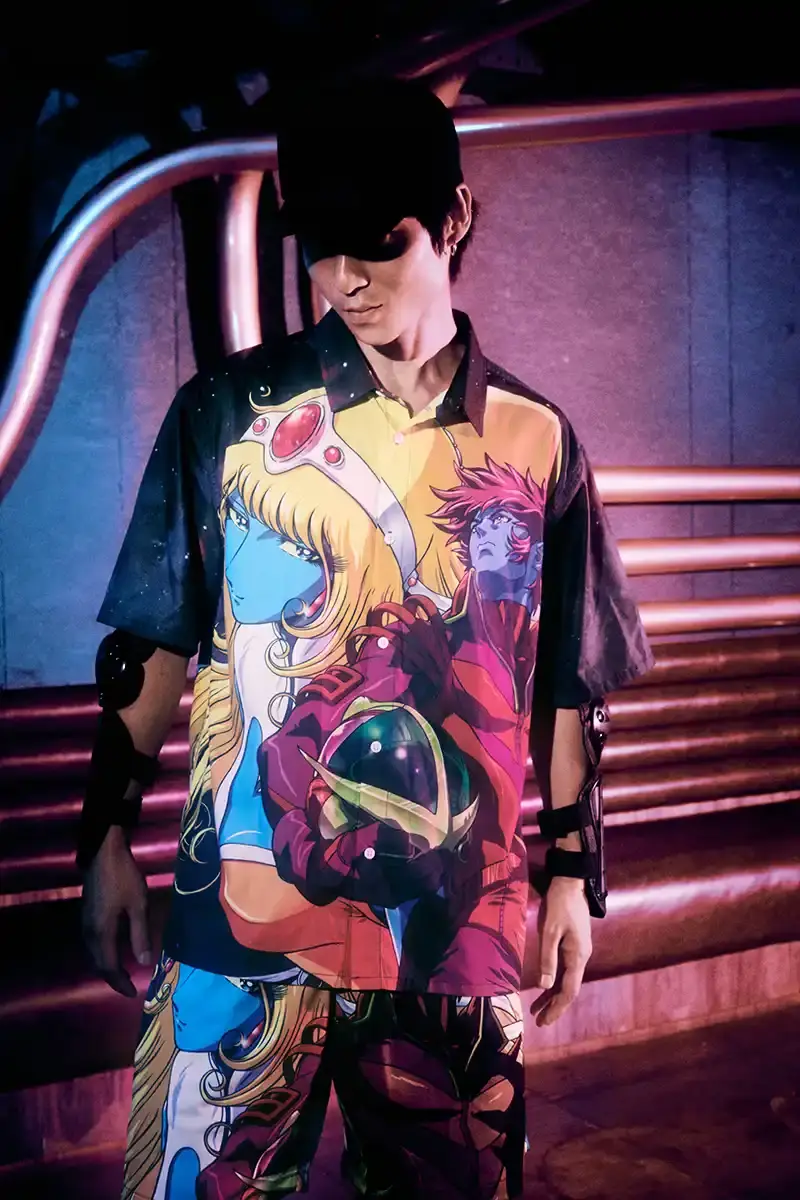 DAFT PUNK TEAMS UP WITH PLEASURES FOR NEW CAPSULE image about fashion collaboration between electronic music duo Daft Punk and streetwear brand PLEASURES. Features clothing and accessories incorporating the musicians' robot helmet imagery, album artwork, and references to their music videos and films. Collection includes hoodies, jackets, jeans, and accessories available July 16, 2025. (image 25 of 28)
