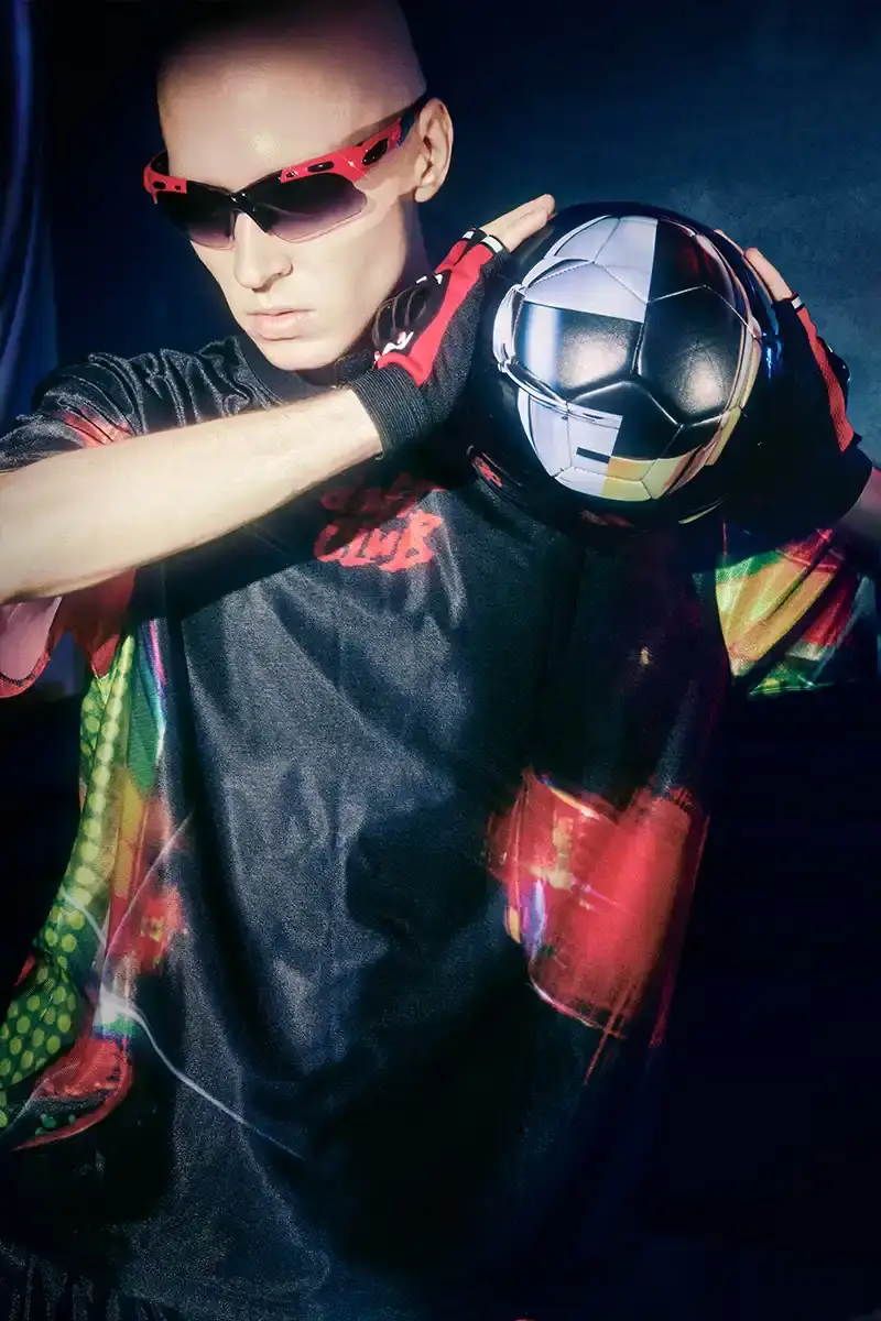 DAFT PUNK TEAMS UP WITH PLEASURES FOR NEW CAPSULE image about fashion collaboration between electronic music duo Daft Punk and streetwear brand PLEASURES. Features clothing and accessories incorporating the musicians' robot helmet imagery, album artwork, and references to their music videos and films. Collection includes hoodies, jackets, jeans, and accessories available July 16, 2025. (image 23 of 28)
