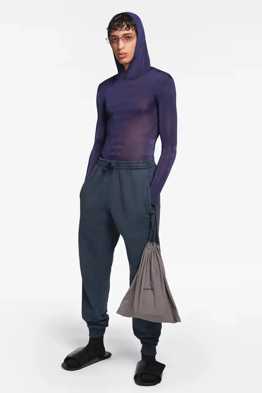 DEMNA PRESENTS FINAL READY-TO-WEAR AT BALENCIAGA image about fashion designer Demna's final ready-to-wear collection for Balenciaga. The Spring 2026 "Exactitudes" collection combines elements from his 35 previous shows during his ten-year tenure. During his leadership, Balenciaga's revenue grew from $400 million to $2 billion. The designer will present one final couture collection in July before departing the fashion house. (image 17 of 31)