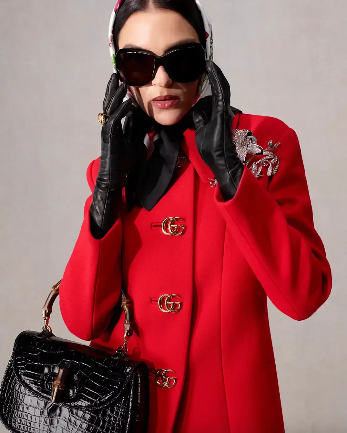 DEMNA PRESENTS LA FAMIGLIA FOR HIS FIRST GUCCI CAMPAIGN Fashion campaign images showing models in various Gucci outfits including gowns, boots, and accessories, photographed by Catherine Opie for Demna's first collection as creative director. (image 4 of 13)