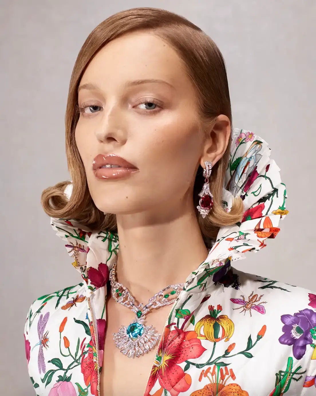 DEMNA PRESENTS LA FAMIGLIA FOR HIS FIRST GUCCI CAMPAIGN Fashion campaign images showing models in various Gucci outfits including gowns, boots, and accessories, photographed by Catherine Opie for Demna's first collection as creative director. (image 6 of 13)