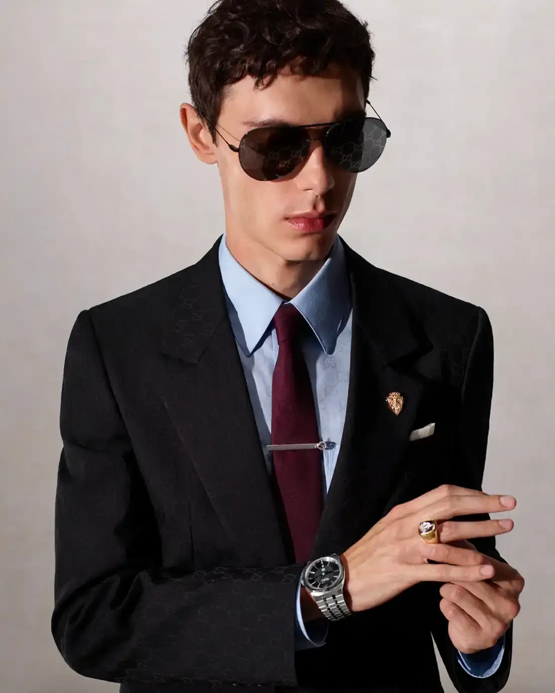 DEMNA PRESENTS LA FAMIGLIA FOR HIS FIRST GUCCI CAMPAIGN Fashion campaign images showing models in various Gucci outfits including gowns, boots, and accessories, photographed by Catherine Opie for Demna's first collection as creative director. (image 2 of 13)