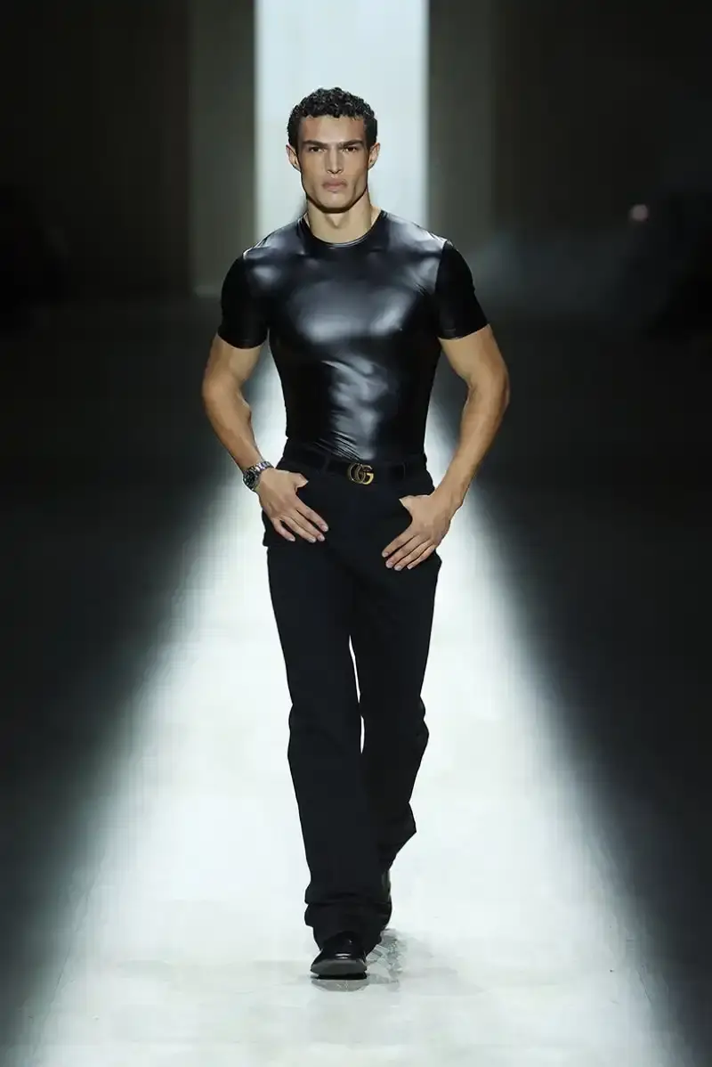 DEMNA'S FIRST GUCCI COLLECTION ARRIVES IN MILAN Demna Gvasalia's first Gucci collection runway show in Milan, featuring seamless garments, tracksuits, and the Manhattan sneaker.