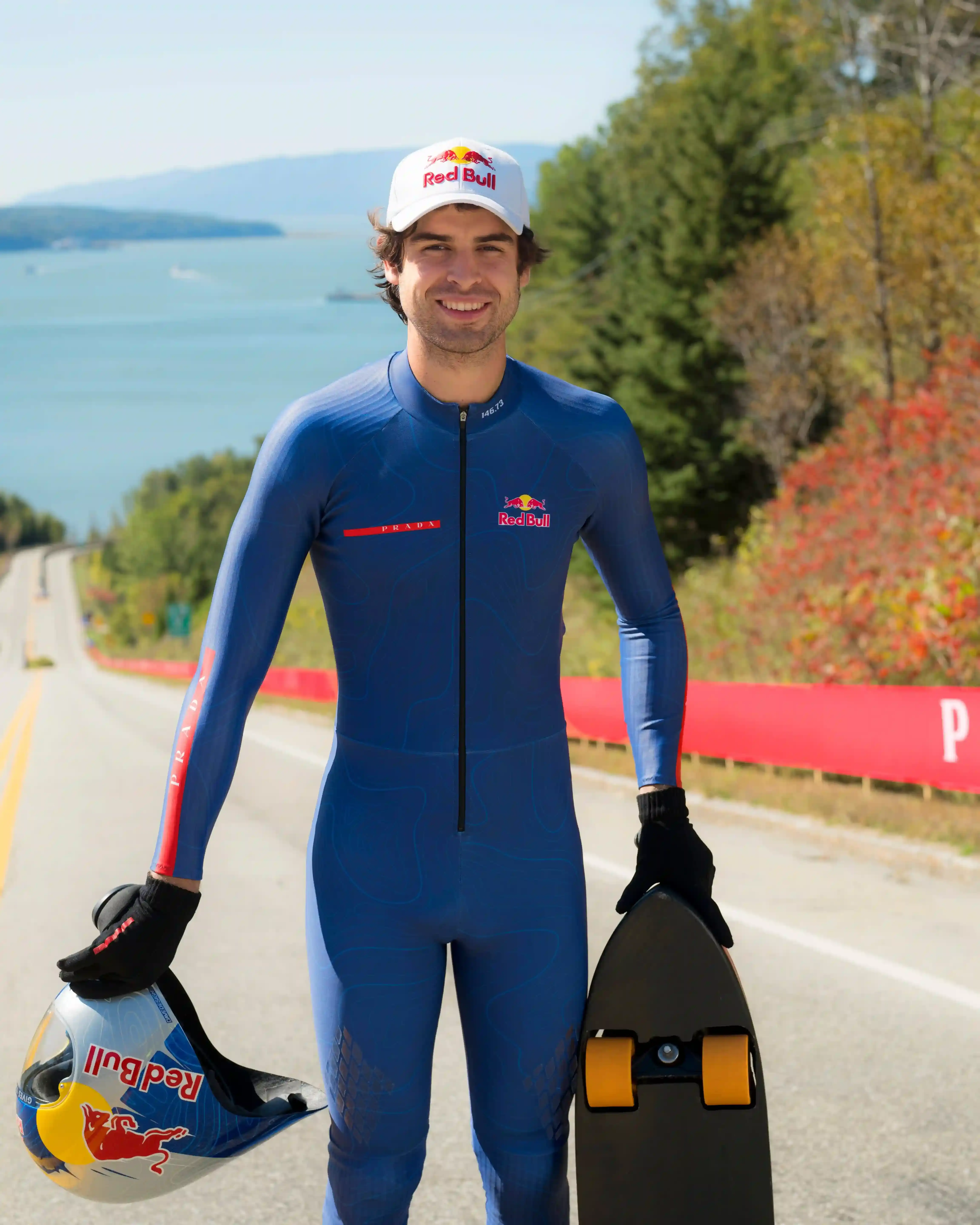 PRADA LINEA ROSSA AND RED BULL BACK PONCELET’S SPEED RECORD about skateboarder Diego Poncelet reaching 151.83 km/h on a closed road in Québec, with details on the record run, his preparation and the shoes and gloves made with Prada Linea Rossa. (image 2 of 2)