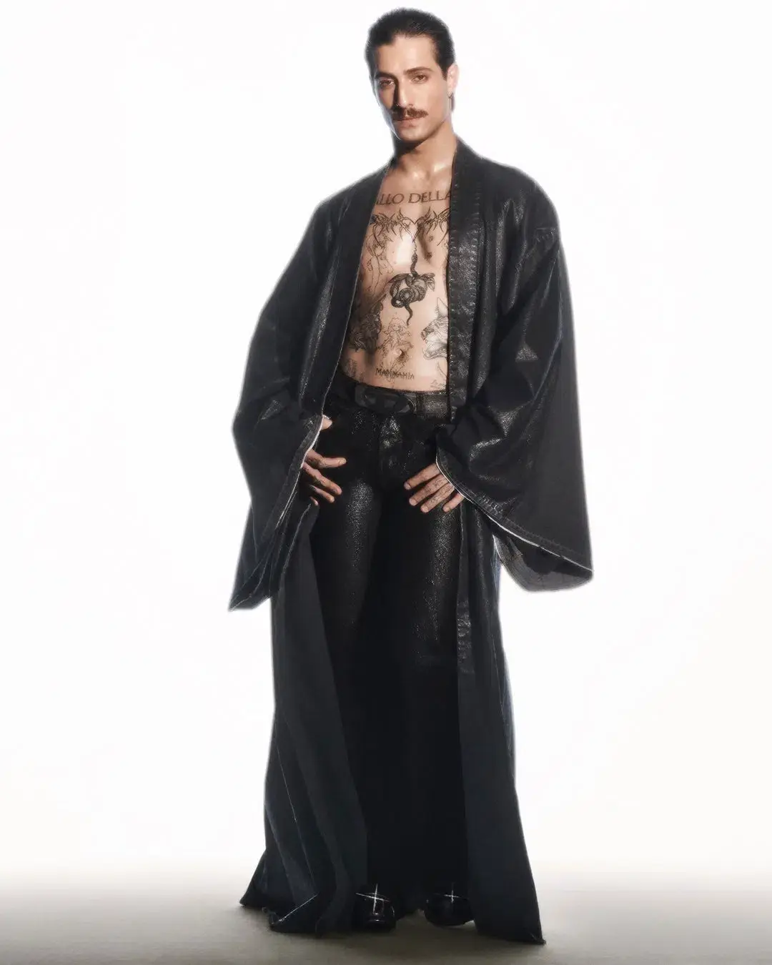 Diesel The article discusses a new capsule collection collaboration between the fashion brand Diesel and Damiano David, the lead singer of the band Måneskin. The collection combines Diesel's edgy, gender-fluid aesthetic with elements inspired by Damiano's personal style and tattoos. Key pieces include oversized tops, drawstring pants, and denim items with distinctive treatments. The capsule is now available for purchase on Diesel's website. (image 4 of 10)