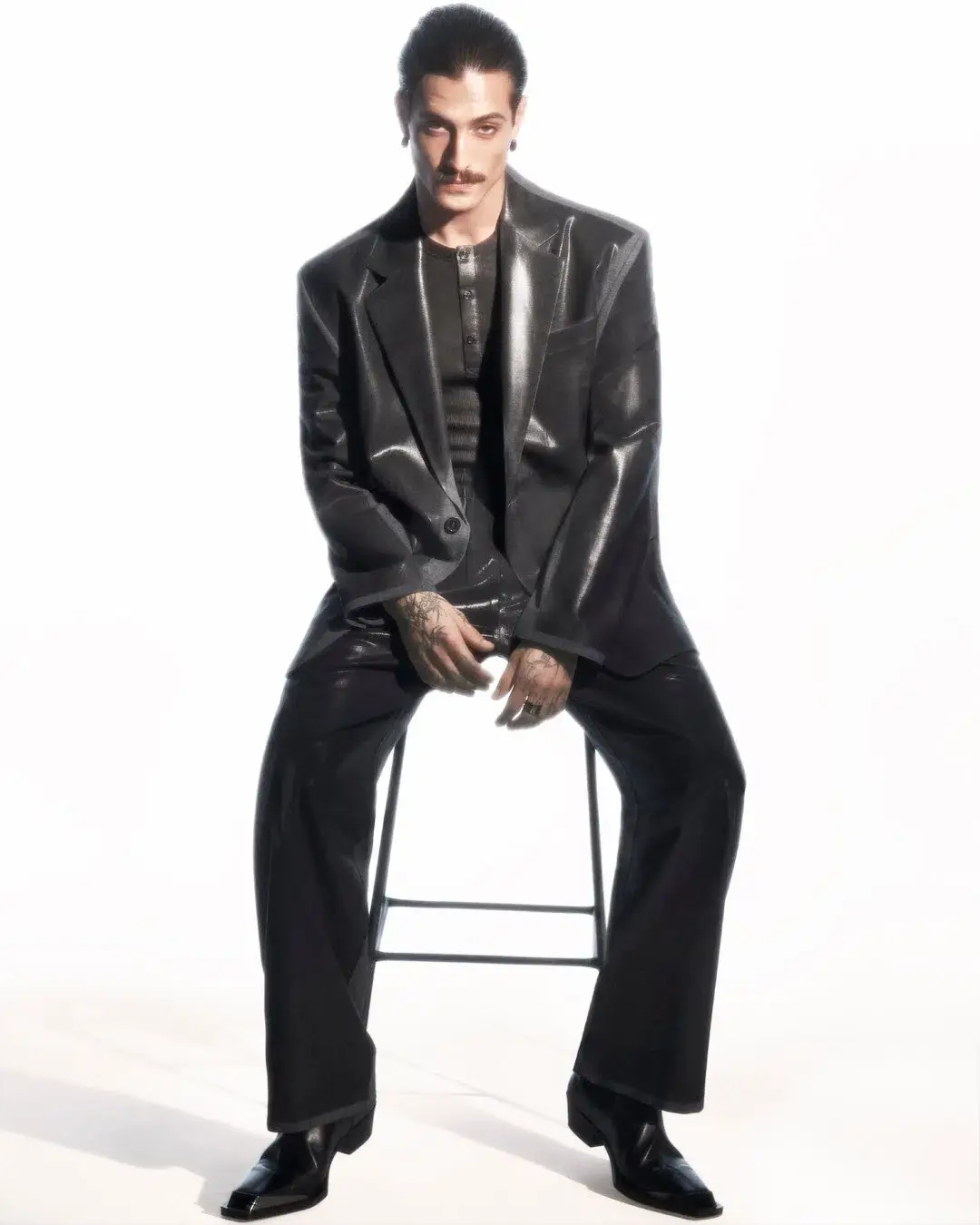 Diesel The article discusses a new capsule collection collaboration between the fashion brand Diesel and Damiano David, the lead singer of the band Måneskin. The collection combines Diesel's edgy, gender-fluid aesthetic with elements inspired by Damiano's personal style and tattoos. Key pieces include oversized tops, drawstring pants, and denim items with distinctive treatments. The capsule is now available for purchase on Diesel's website. (image 8 of 10)