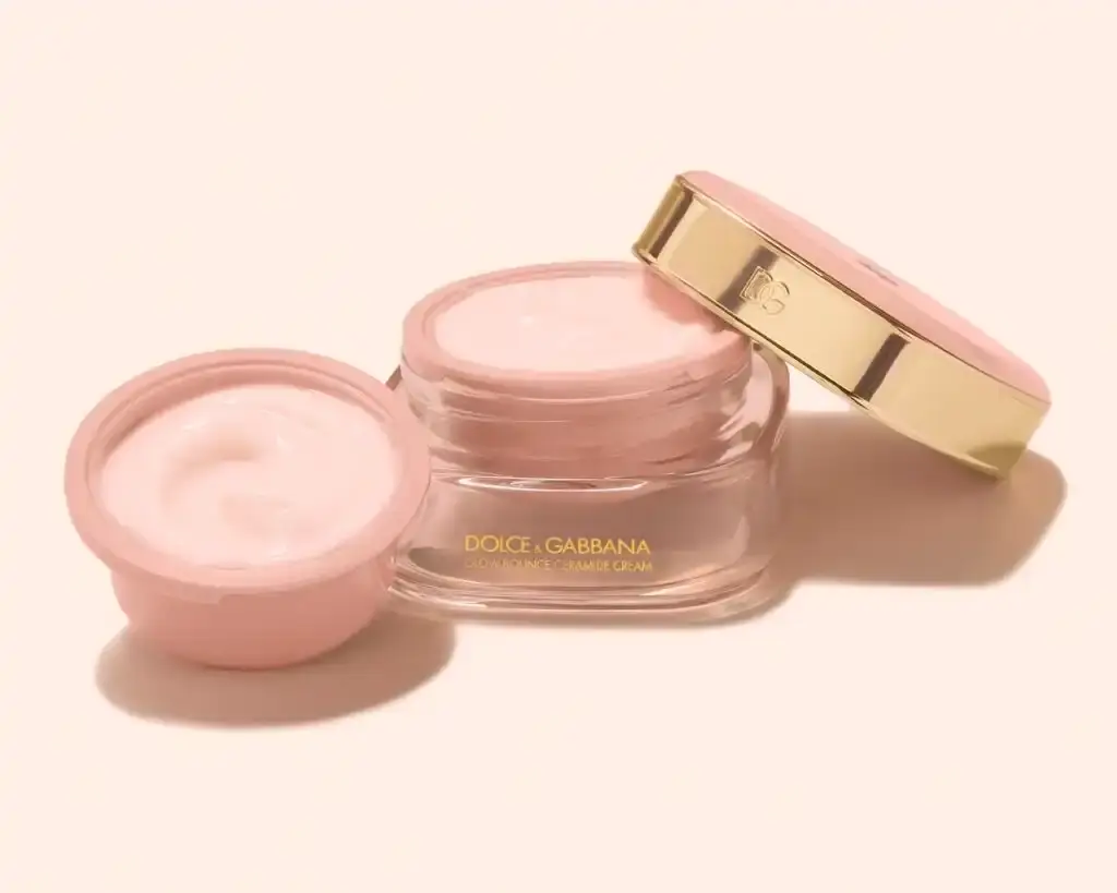 Dolce&Gabbana Dolce&Gabbana's new pre-makeup collection featuring elegantly packaged skincare products with neutral tones and gold accents inspired by luxury lingerie. (image 2 of 5)