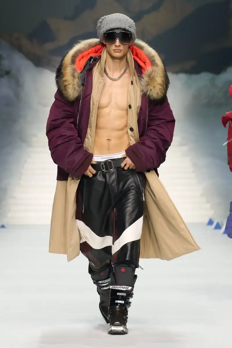 DSQUARED2 FALL/WINTER 2026 MENSWEAR DSQUARED2 Fall/Winter 2026 menswear collection at Milan Fashion Week features ski slope aesthetics, oversized puffers, technical sportswear, and Canadian-inspired designs with emphasis on layering and attitude. (image 7 of 14)