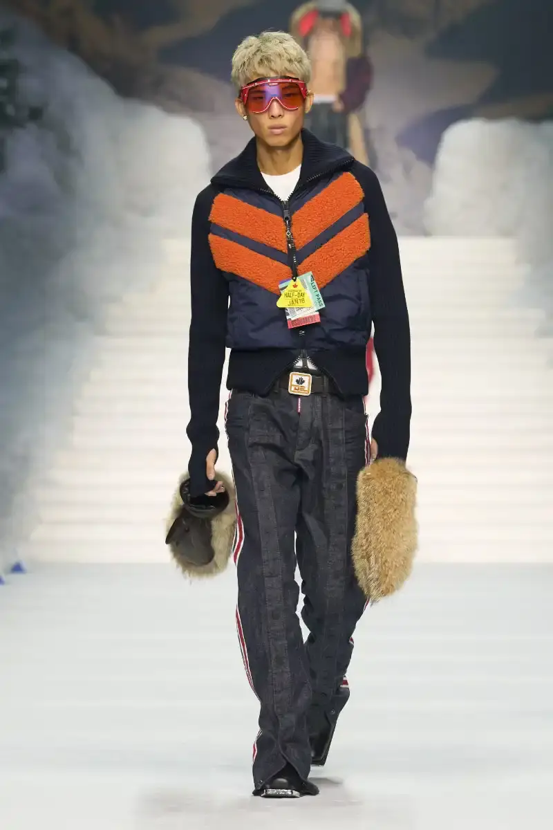 DSQUARED2 FALL/WINTER 2026 MENSWEAR DSQUARED2 Fall/Winter 2026 menswear collection at Milan Fashion Week features ski slope aesthetics, oversized puffers, technical sportswear, and Canadian-inspired designs with emphasis on layering and attitude. (image 8 of 14)