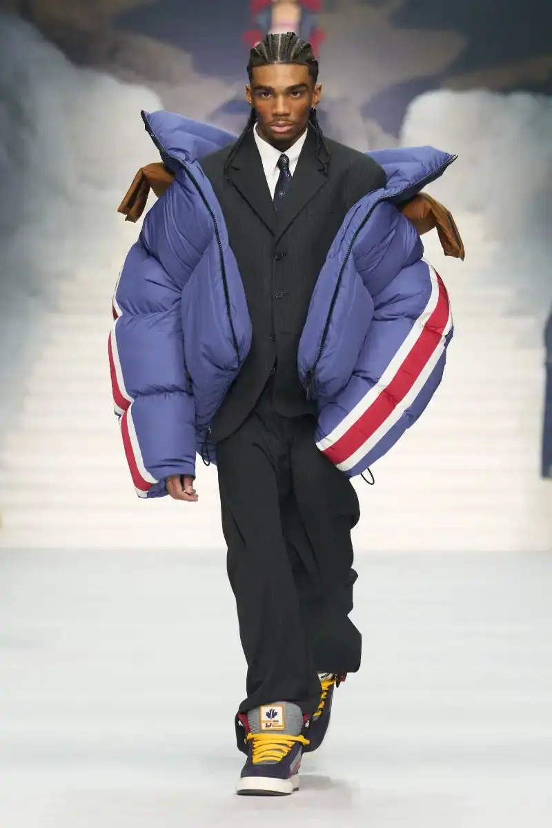 DSQUARED2 FALL/WINTER 2026 MENSWEAR DSQUARED2 Fall/Winter 2026 menswear collection at Milan Fashion Week features ski slope aesthetics, oversized puffers, technical sportswear, and Canadian-inspired designs with emphasis on layering and attitude.