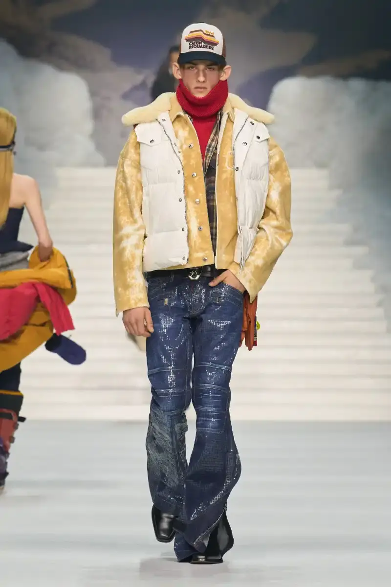 DSQUARED2 FALL/WINTER 2026 MENSWEAR DSQUARED2 Fall/Winter 2026 menswear collection at Milan Fashion Week features ski slope aesthetics, oversized puffers, technical sportswear, and Canadian-inspired designs with emphasis on layering and attitude. (image 10 of 14)