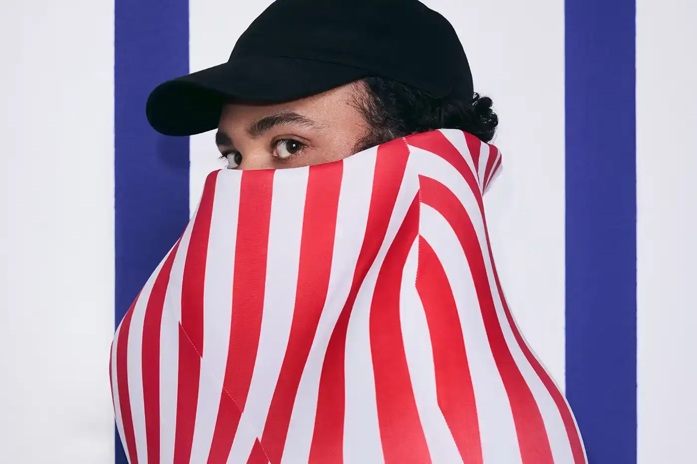 foto of Duran Lantink as Jean Paul Gaultier's new creative director. It covers Lantink's background and achievements, the end of JPG's guest designer era, and includes quotes from both Gaultier and Lantink. The article mentions Lantink's education in Amsterdam, his recognition through various fashion awards, and notes that his first collections for the brand will debut in September 2025 and January 2026.