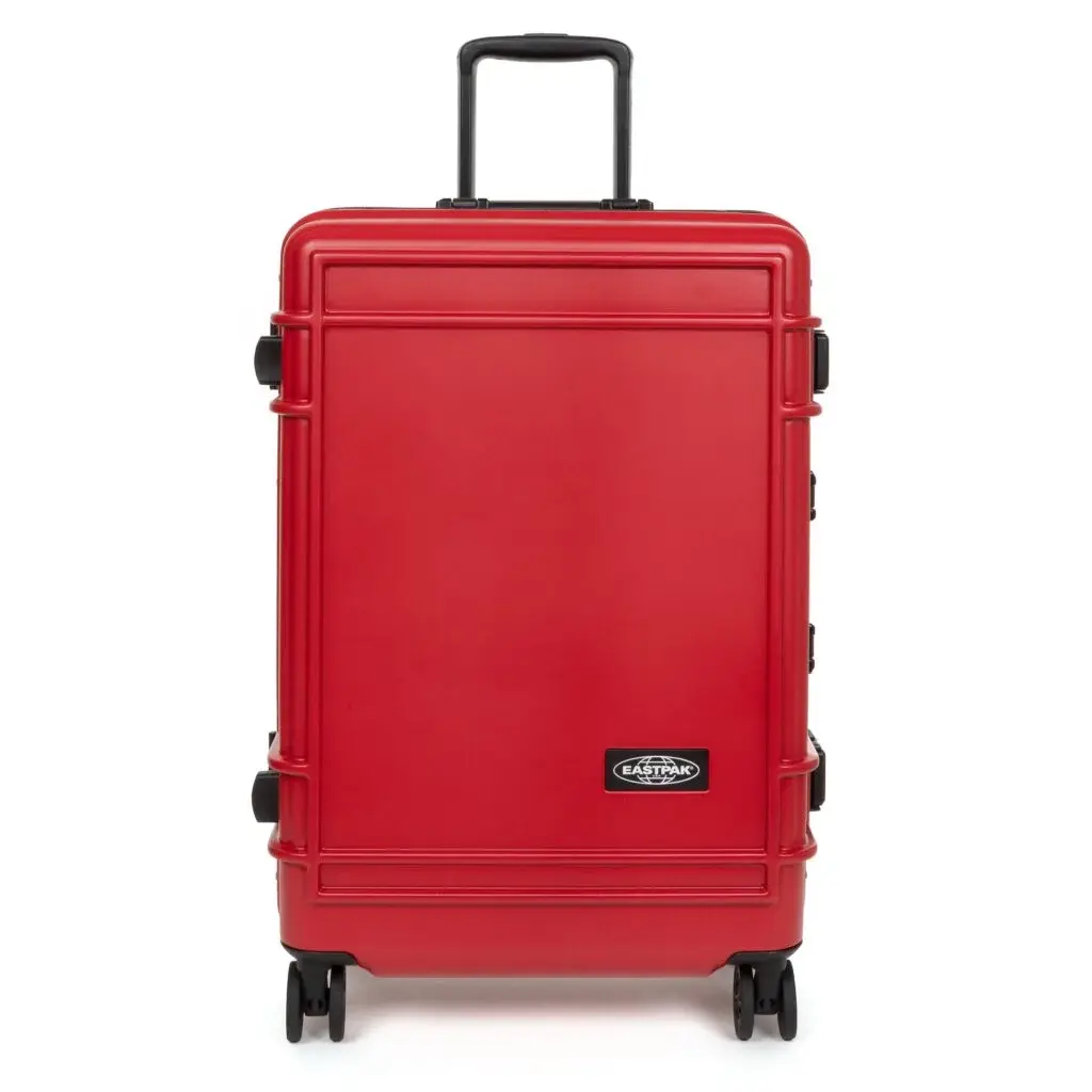 Eastpak Eastpak Resist'r Case hard-shell luggage in three sizes - small, medium, and large - displayed in red, gray, and black colors. The suitcases feature a sleek polycarbonate exterior with aluminum frame, quiet wheels, and TSA-approved locks. Eastpak logo visible on the front (image 2 of 3)