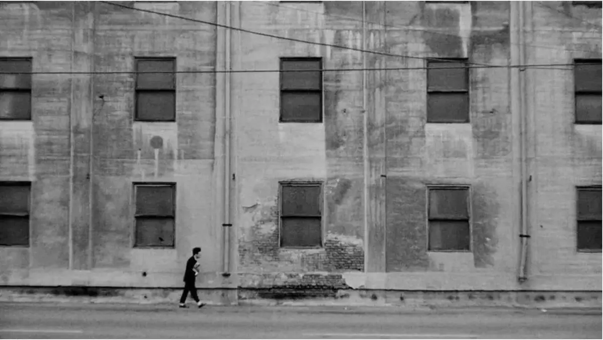 image analyzing the thematic similarities between a scene in the 1977 film Eraserhead and modern social media algorithms, focusing on human psychology. (image 3 of 4)