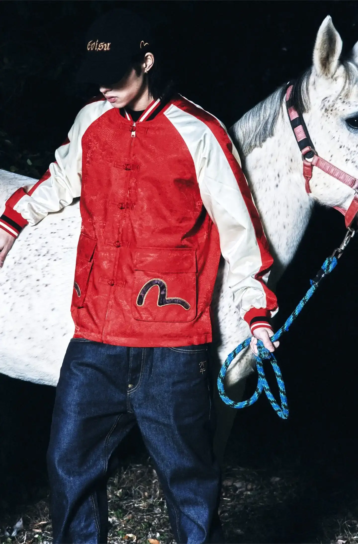 YEAR OF THE HORSE INSPIRES EVISU DENIM EVISU's 2026 Lunar New Year collection features detailed embroidery and traditional Japanese craftsmanship on denim pieces celebrating the Year of the Horse. (image 4 of 5)