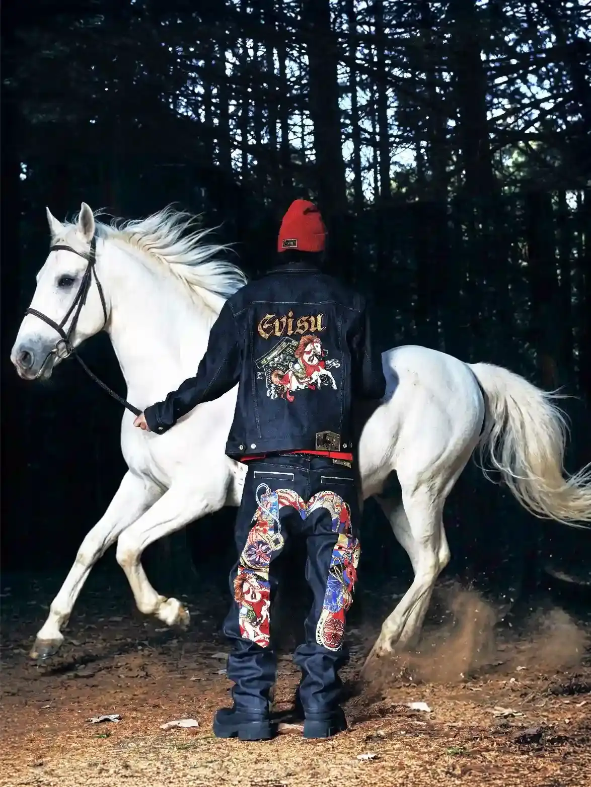 YEAR OF THE HORSE INSPIRES EVISU DENIM EVISU's 2026 Lunar New Year collection features detailed embroidery and traditional Japanese craftsmanship on denim pieces celebrating the Year of the Horse. (image 2 of 5)