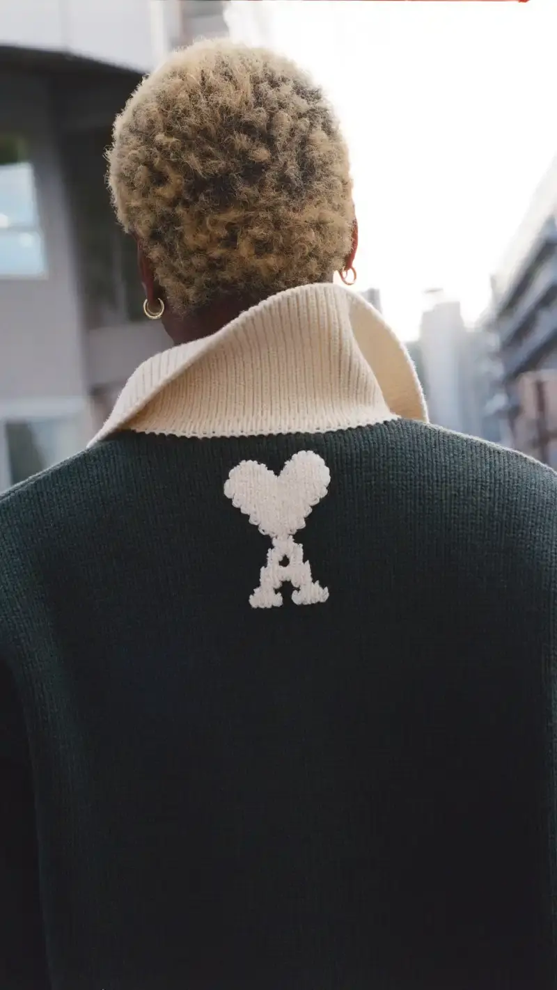 FARFETCH LUNAR NEW YEAR COLLECTION WITH AMI PARIS Farfetch partners with AMI Paris for a limited Lunar New Year capsule collection honoring the Year of the Fire Horse, available worldwide for three weeks starting January 19, 2026. (image 3 of 3)