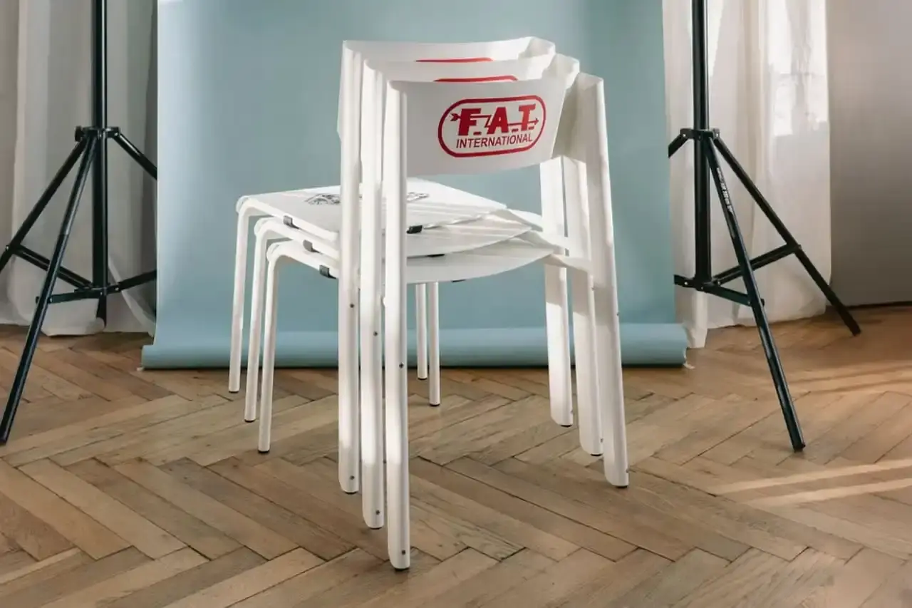 FAT International Limited-edition aluminum chair with racing-inspired design, featuring sleek metal frame and Porsche 959 graphic detail. Created by Marco Dessi for FAT International. (image 3 of 5)