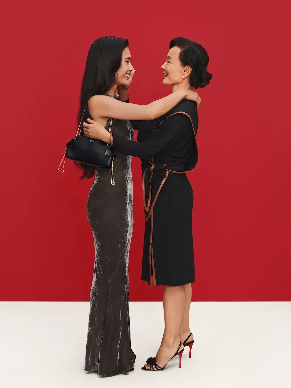FERRAGAMO HOLIDAY 2026 CAMPAIGN STARS KRIS JENNER image of Ferragamo’s Holiday 2026 campaign, The Joy of Loving, in which Kris Jenner plays an imagined director and introduces a cast of real families, siblings and partners. (image 5 of 7)