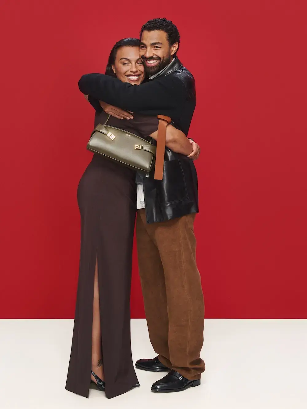 FERRAGAMO HOLIDAY 2026 CAMPAIGN STARS KRIS JENNER image of Ferragamo’s Holiday 2026 campaign, The Joy of Loving, in which Kris Jenner plays an imagined director and introduces a cast of real families, siblings and partners. (image 2 of 7)