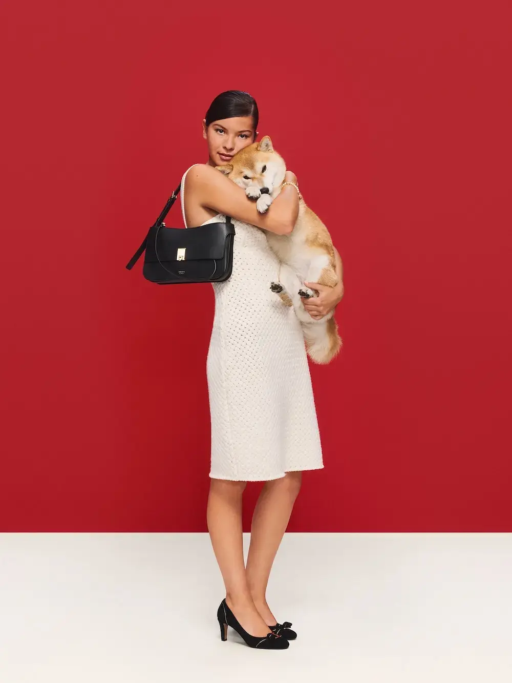 FERRAGAMO HOLIDAY 2026 CAMPAIGN STARS KRIS JENNER image of Ferragamo’s Holiday 2026 campaign, The Joy of Loving, in which Kris Jenner plays an imagined director and introduces a cast of real families, siblings and partners. (image 4 of 7)