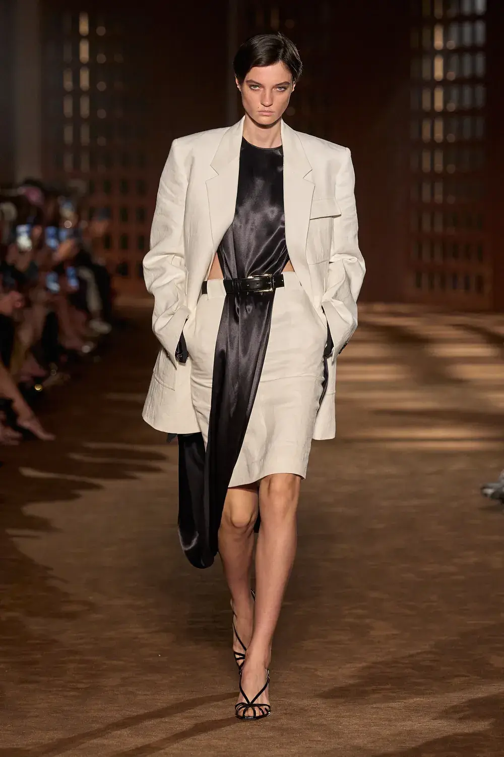 FERRAGAMO SPRING SUMMER 2027 COLLECTION image of the Ferragamo Spring Summer 2027 collection detailing the 1940s inspired clothing and footwear. (image 50 of 61)