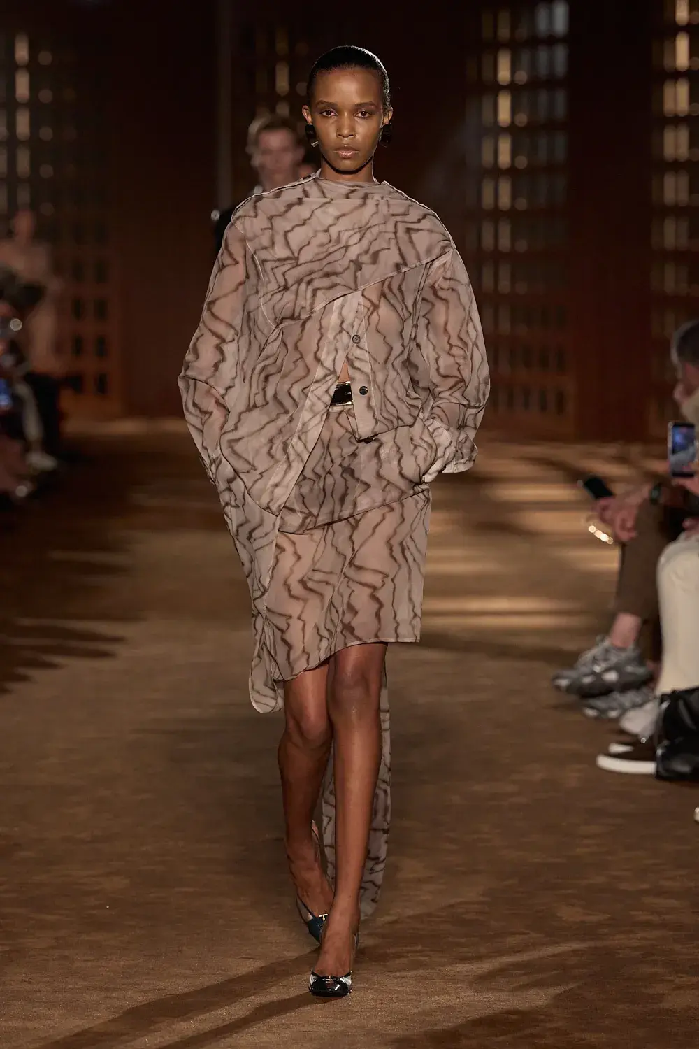 FERRAGAMO SPRING SUMMER 2027 COLLECTION image of the Ferragamo Spring Summer 2027 collection detailing the 1940s inspired clothing and footwear. (image 48 of 61)