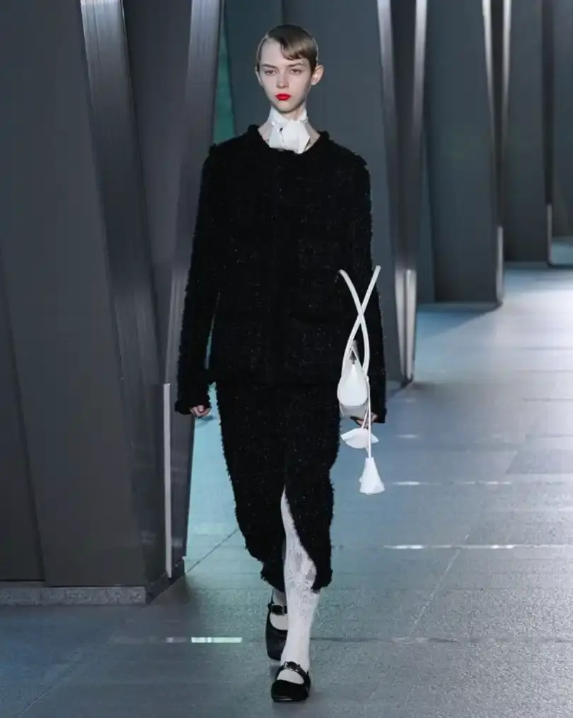 FETICO FW26 REINTERPRETS 1930S SILHOUETTES image of the FETICO Fall/Winter 2026 fashion collection focusing on materials, design references, and specific garment details. (image 13 of 14)