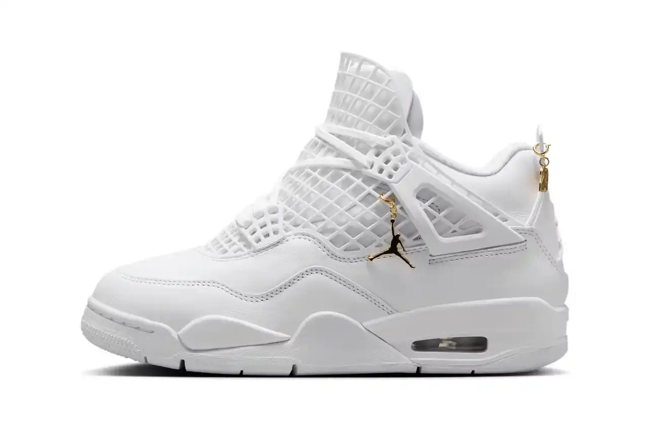 Nike White Air Jordan 4 NET sneaker with expanded netting covering the upper and tongue, featuring metallic gold Jumpman logo and all-white leather and textile construction. Copy