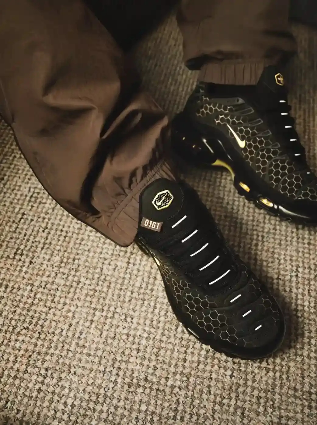 FOOT LOCKER DROPS NIKE TN FOR MANCHESTER Foot Locker announces Nike Air Max TN Manchester sneaker featuring bee-inspired design elements and honeycomb pattern, available exclusively at Foot Locker stores from February 5, 2026. (image 2 of 12)