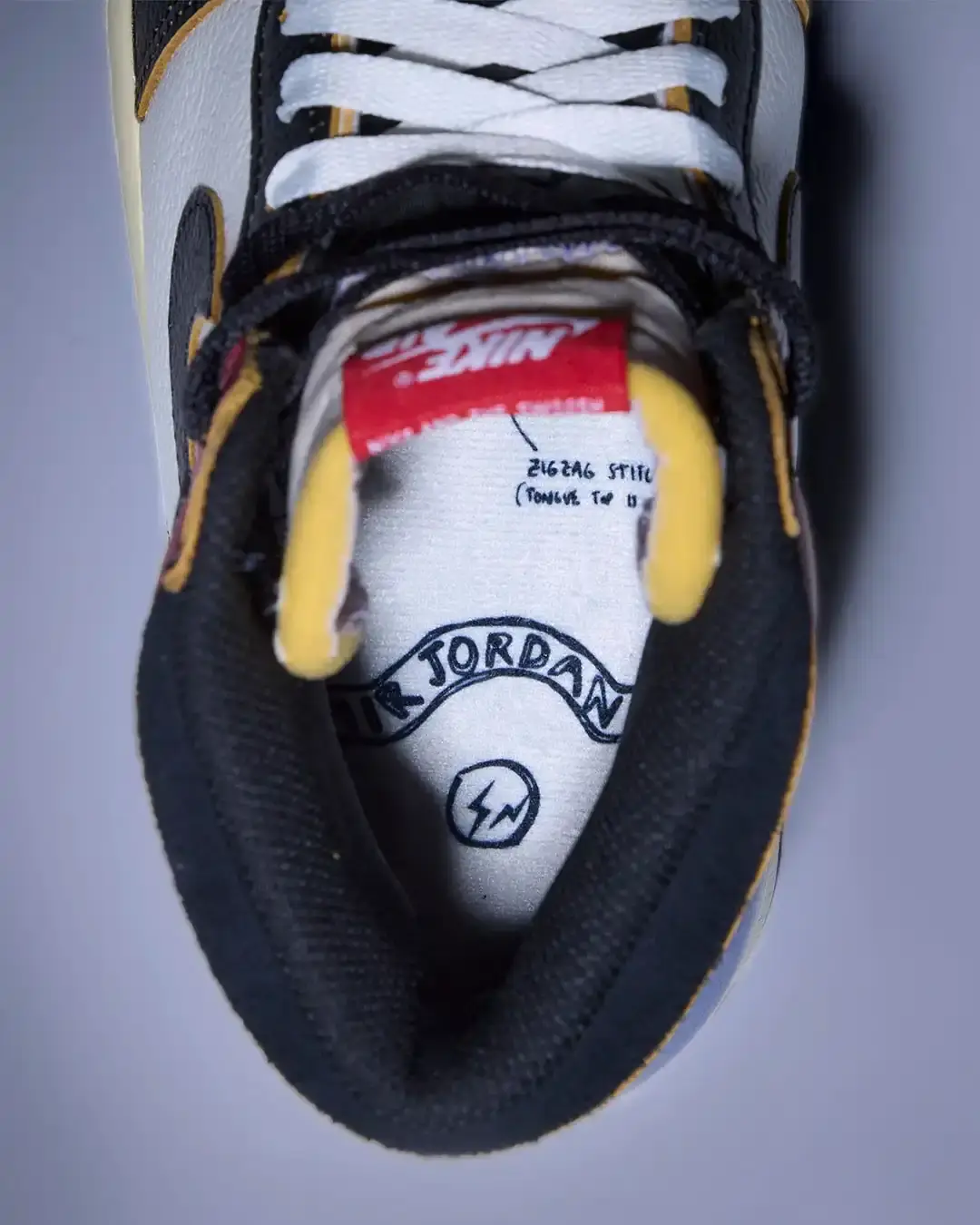 FRAGMENT UNION JORDAN 1 DROPS FEBRUARY 14 image about the Air Jordan 1 High collaboration between fragment design and Union Los Angeles, featuring deconstructed design elements and a hybrid colorway combining Black Toe and Sport Blue aesthetics, releasing February 14. (image 4 of 4)
