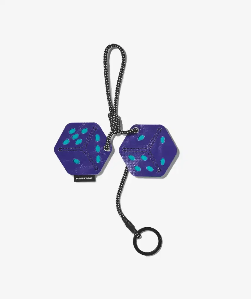 FREITAG TRANSFORMS PRODUCTION WASTE INTO BAG CHARMS image about FREITAG's new Lucky Trucking Charms collection, which repurposes production waste from truck tarps into bag accessories and keychains. (image 6 of 9)