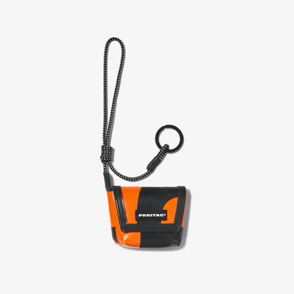FREITAG TRANSFORMS PRODUCTION WASTE INTO BAG CHARMS image about FREITAG's new Lucky Trucking Charms collection, which repurposes production waste from truck tarps into bag accessories and keychains. (image 9 of 9)