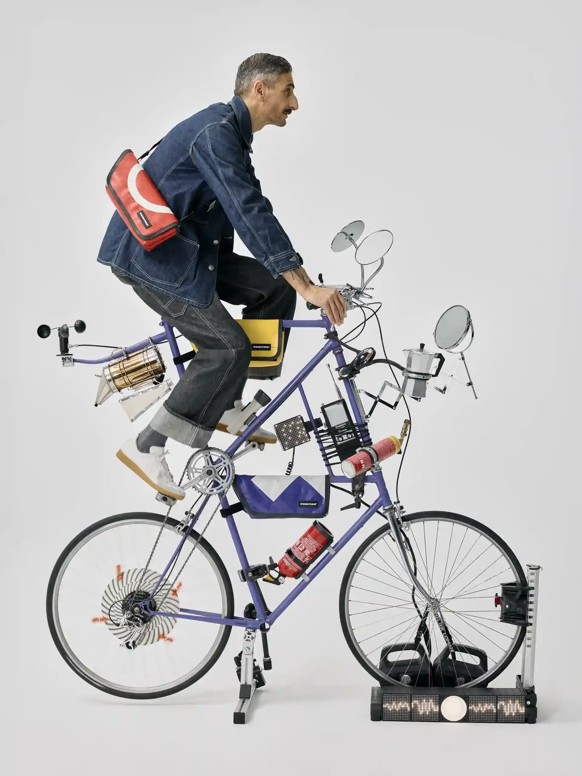 FREITAG RELEASES THREE NEW BICYCLE BAGS An image detailing three new Freitag bags designed for bicycles featuring recycled truck tarpaulins and reflective elements. (image 3 of 7)