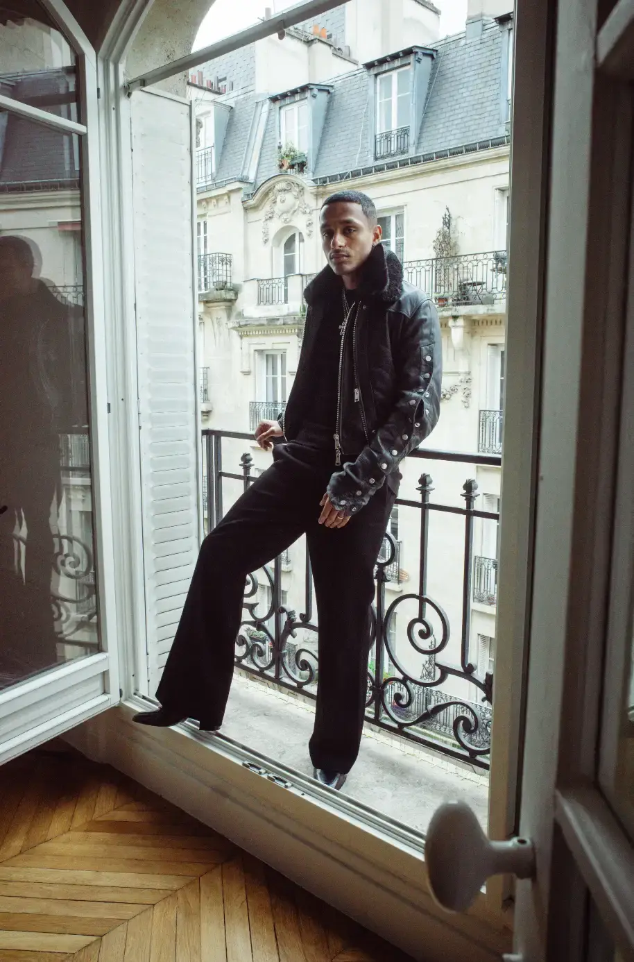 icykof shoot & interview in Paris with casawi magazine, wearing leather jacket and On running beanie. photography by Lorenzo Bonanni