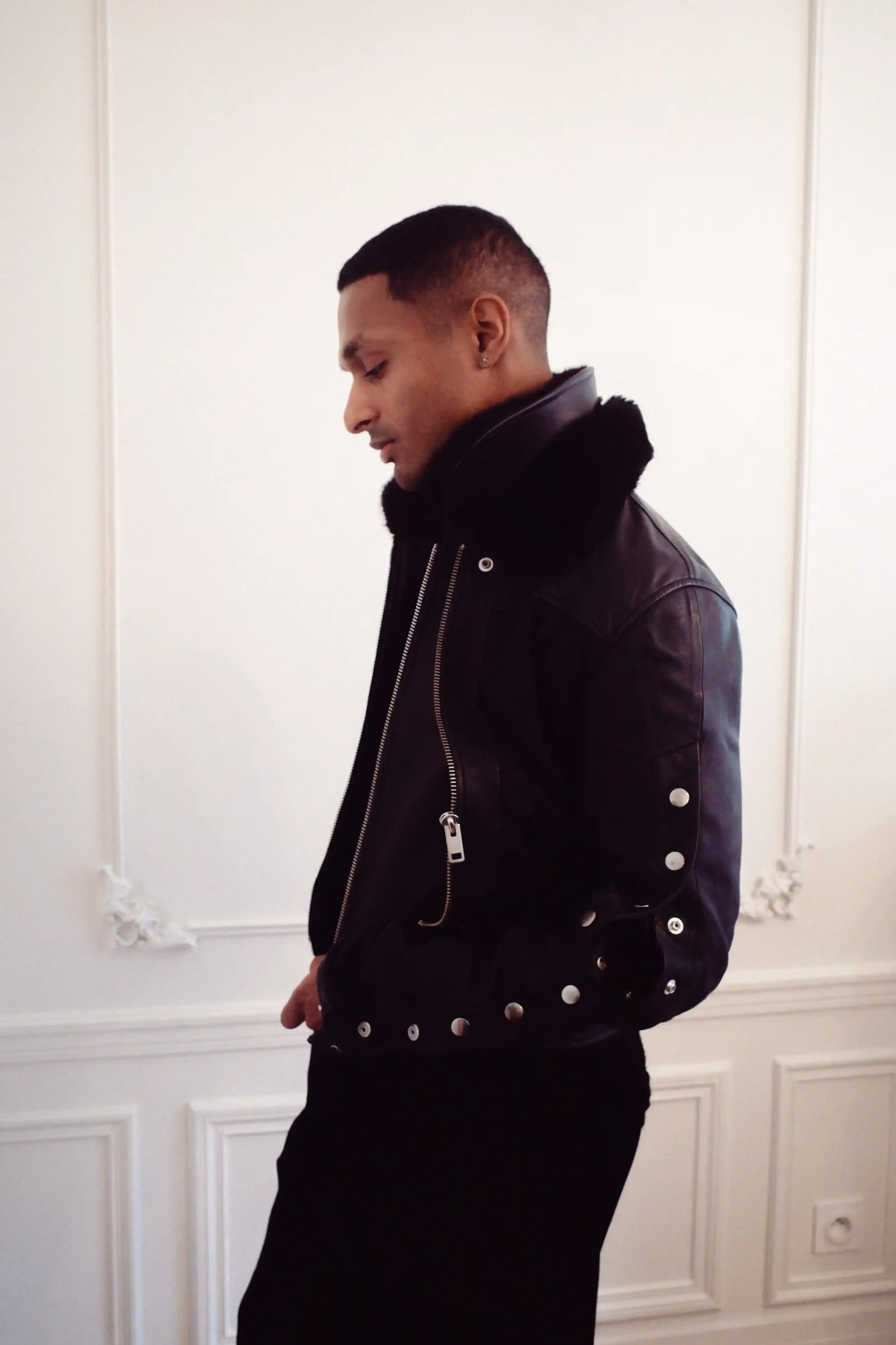 FROM YOUTUBE TO DJ AND PRODUCER: THE EVOLUTION OF ICYKOF icykof shoot & interview in Paris with casawi magazine, wearing leather jacket and On running beanie. photography by Lorenzo Bonanni (image 2 of 6)