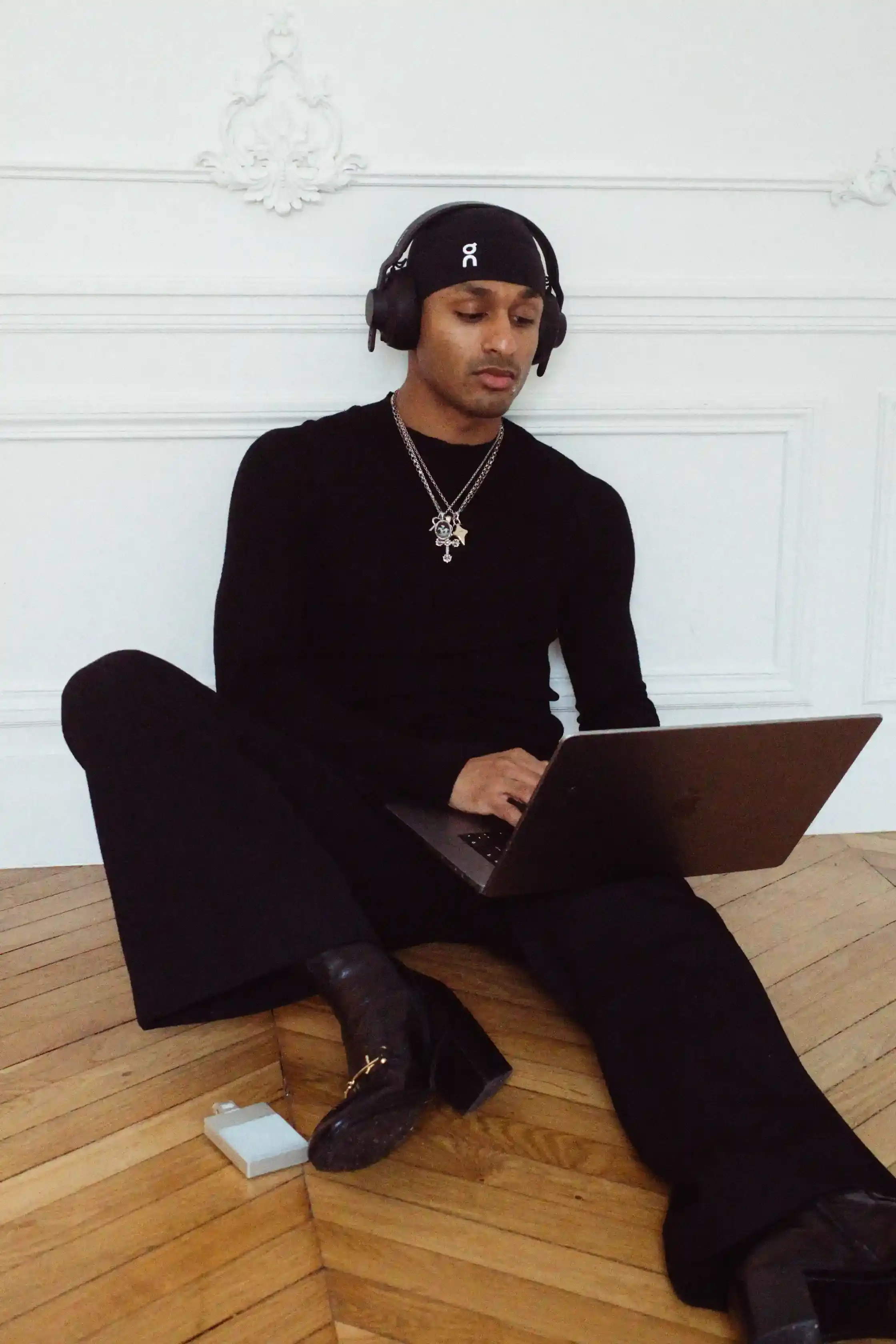 FROM YOUTUBE TO DJ AND PRODUCER: THE EVOLUTION OF ICYKOF icykof shoot & interview in Paris with casawi magazine, wearing leather jacket and On running beanie. photography by Lorenzo Bonanni (image 1 of 6)