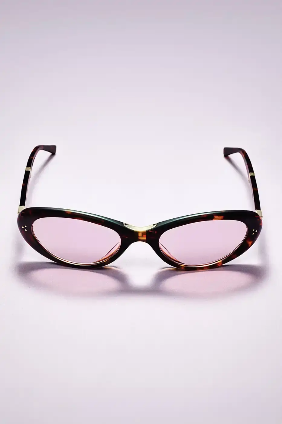 GENTLE MONSTER PARTNERS WITH BRATZ FOR POCKET EYEWEAR LINE image of th collaboration between eyewear manufacturer Gentle Monster and toy brand Bratz. The partnership produces a limited collection of 21 foldable sunglasses and optical frames with early 2000s design influences. The article covers product features, marketing campaign details featuring K-pop artist Karina, international pop-up store locations with specialty food partnerships, and release information scheduled for late May 2024. Content is presented in standard news article format with factual reporting on product specifications, availability, and promotional activities across four major cities. (image 6 of 9)