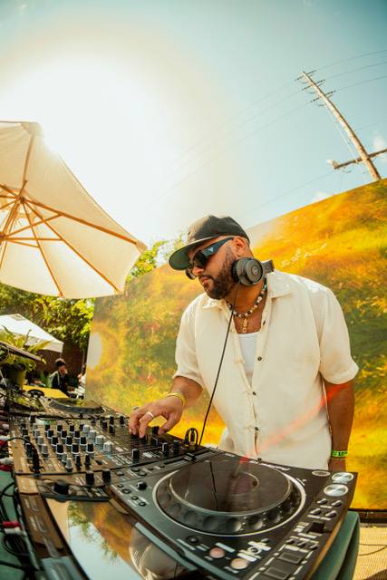 Gianni Carter playing music with console pioneer in LA
