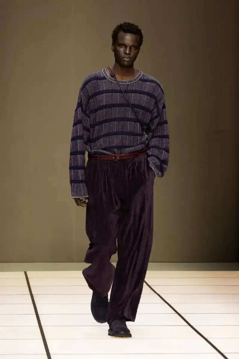 GIORGIO ARMANI FALL/WINTER 2026 COLLECTION Giorgio Armani Fall/Winter 2026 collection debut by Leo Dell'Orco at Milan Fashion Week features iridescent colors and fluid silhouettes.