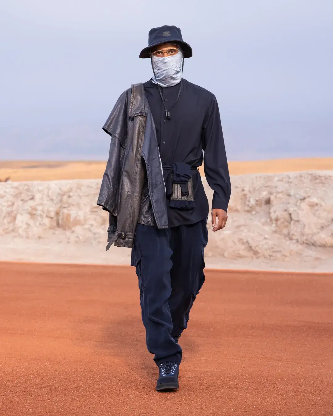 GIORGIO ARMANI AND KITH PRESENT DREAMS OF THE DUNE IN MARRAKECH image about the Giorgio Armani and Kith menswear collection Dreams of the Dune, shown in the Agafay Desert near Marrakech, with details on the clothing, the ASICS, Diemme and ‘47 collaborations, and the 16 October launch. (image 4 of 18)