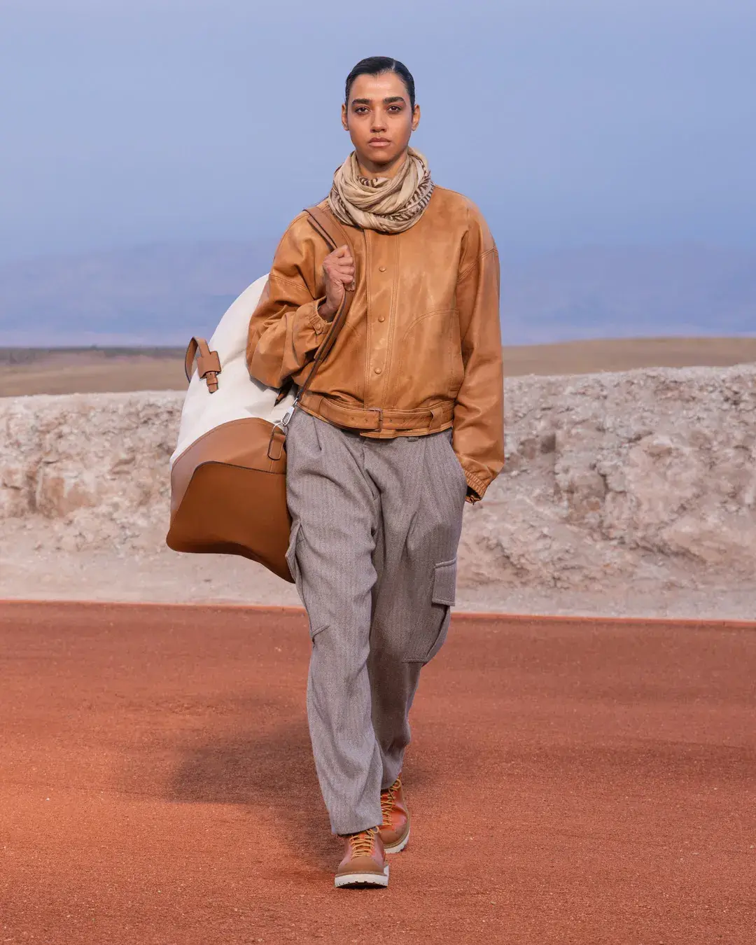 GIORGIO ARMANI AND KITH PRESENT DREAMS OF THE DUNE IN MARRAKECH image about the Giorgio Armani and Kith menswear collection Dreams of the Dune, shown in the Agafay Desert near Marrakech, with details on the clothing, the ASICS, Diemme and ‘47 collaborations, and the 16 October launch. (image 11 of 18)