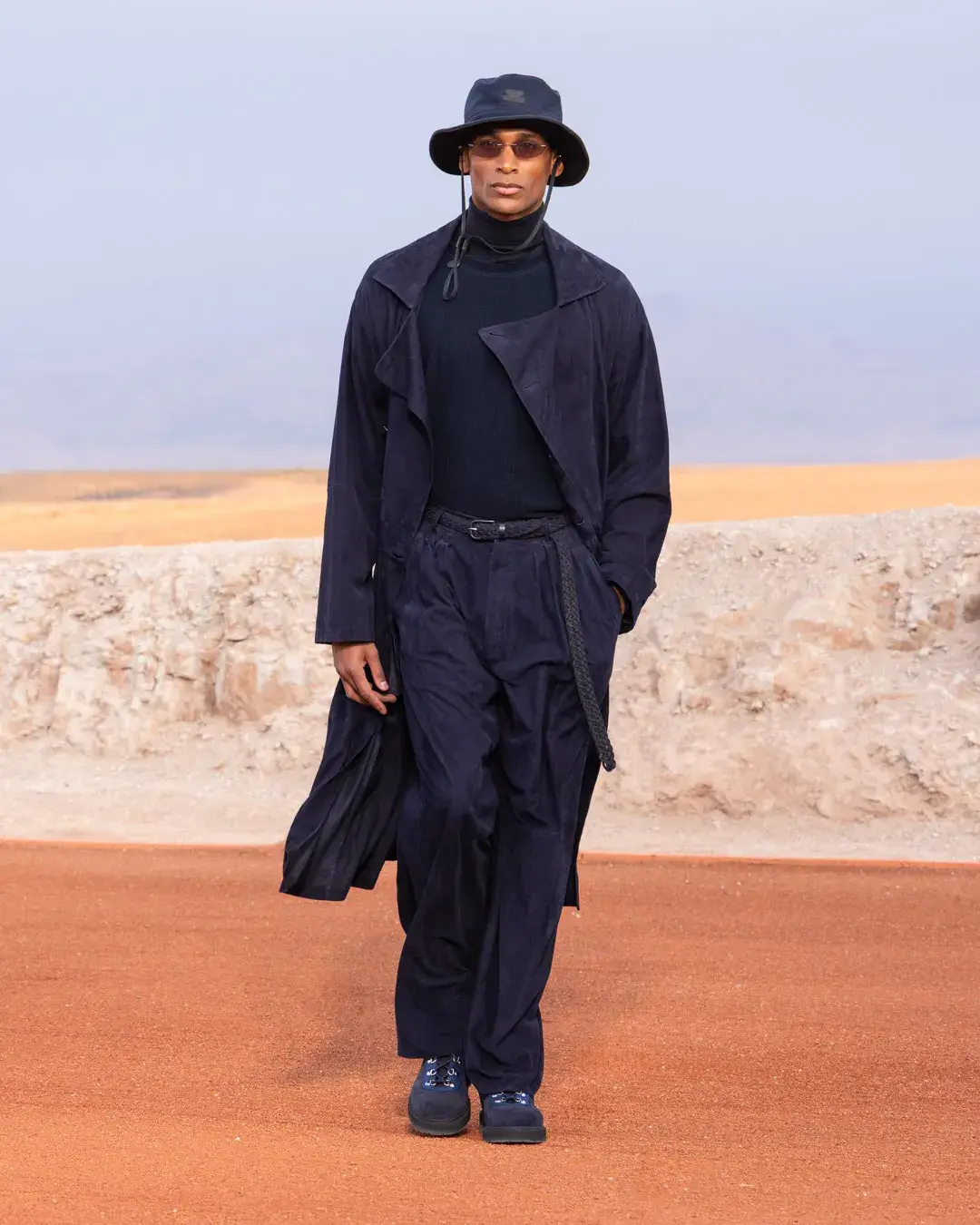 GIORGIO ARMANI AND KITH PRESENT DREAMS OF THE DUNE IN MARRAKECH image about the Giorgio Armani and Kith menswear collection Dreams of the Dune, shown in the Agafay Desert near Marrakech, with details on the clothing, the ASICS, Diemme and ‘47 collaborations, and the 16 October launch. (image 3 of 18)