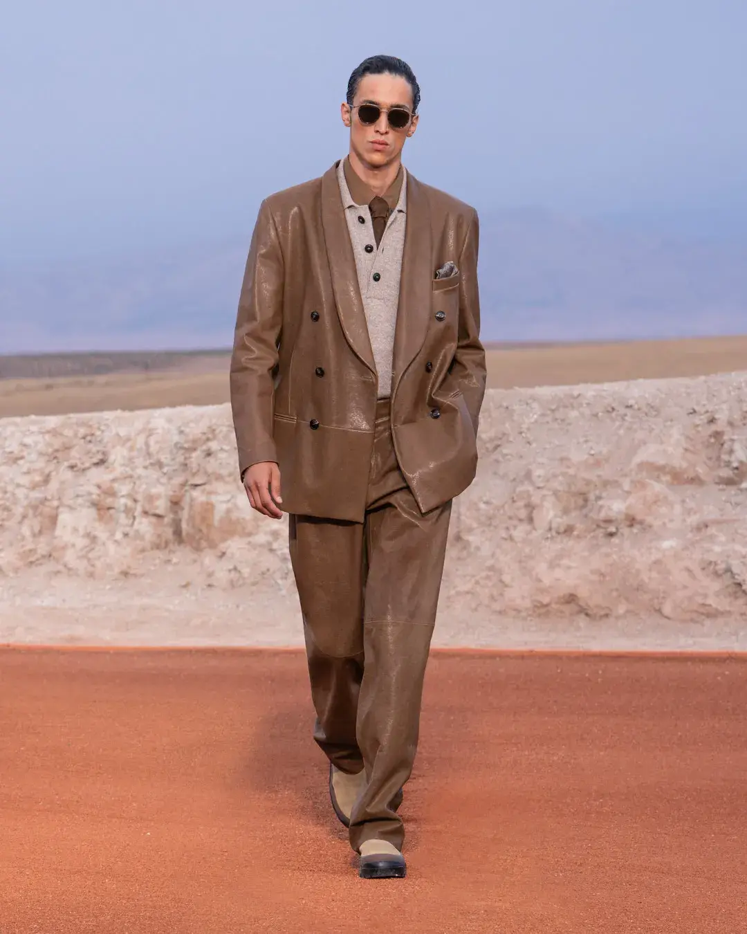 GIORGIO ARMANI AND KITH PRESENT DREAMS OF THE DUNE IN MARRAKECH image about the Giorgio Armani and Kith menswear collection Dreams of the Dune, shown in the Agafay Desert near Marrakech, with details on the clothing, the ASICS, Diemme and ‘47 collaborations, and the 16 October launch. (image 9 of 18)