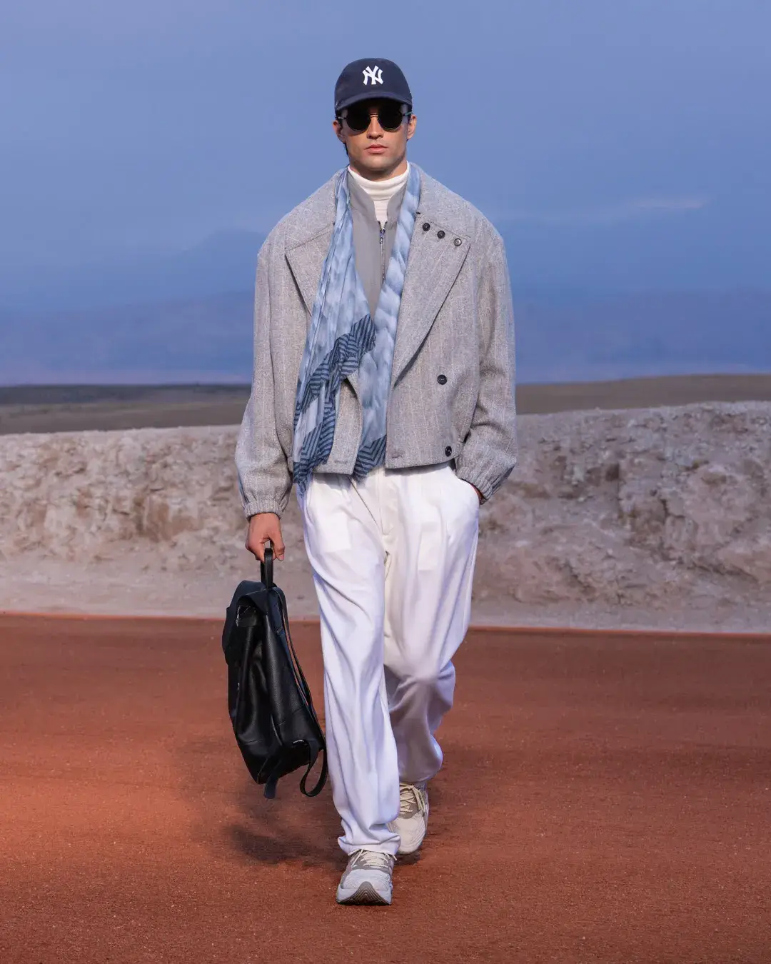 GIORGIO ARMANI AND KITH PRESENT DREAMS OF THE DUNE IN MARRAKECH image about the Giorgio Armani and Kith menswear collection Dreams of the Dune, shown in the Agafay Desert near Marrakech, with details on the clothing, the ASICS, Diemme and ‘47 collaborations, and the 16 October launch. (image 16 of 18)