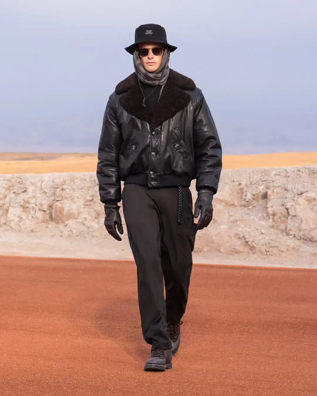 GIORGIO ARMANI AND KITH PRESENT DREAMS OF THE DUNE IN MARRAKECH image about the Giorgio Armani and Kith menswear collection Dreams of the Dune, shown in the Agafay Desert near Marrakech, with details on the clothing, the ASICS, Diemme and ‘47 collaborations, and the 16 October launch.