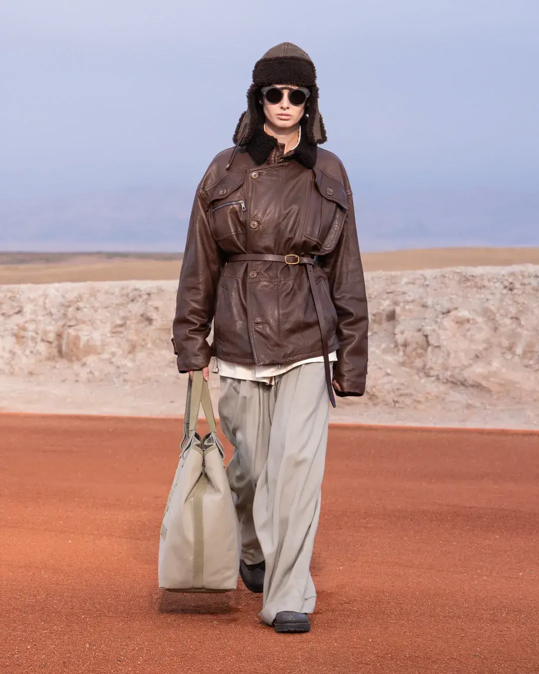 GIORGIO ARMANI AND KITH PRESENT DREAMS OF THE DUNE IN MARRAKECH image about the Giorgio Armani and Kith menswear collection Dreams of the Dune, shown in the Agafay Desert near Marrakech, with details on the clothing, the ASICS, Diemme and ‘47 collaborations, and the 16 October launch. (image 6 of 18)