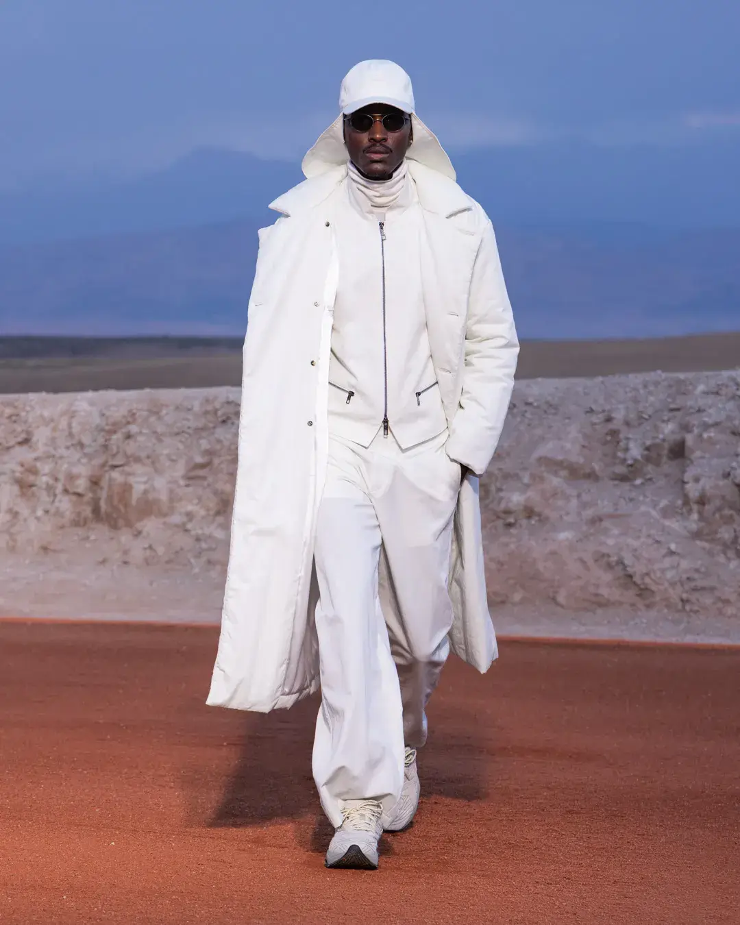 GIORGIO ARMANI AND KITH PRESENT DREAMS OF THE DUNE IN MARRAKECH image about the Giorgio Armani and Kith menswear collection Dreams of the Dune, shown in the Agafay Desert near Marrakech, with details on the clothing, the ASICS, Diemme and ‘47 collaborations, and the 16 October launch. (image 18 of 18)