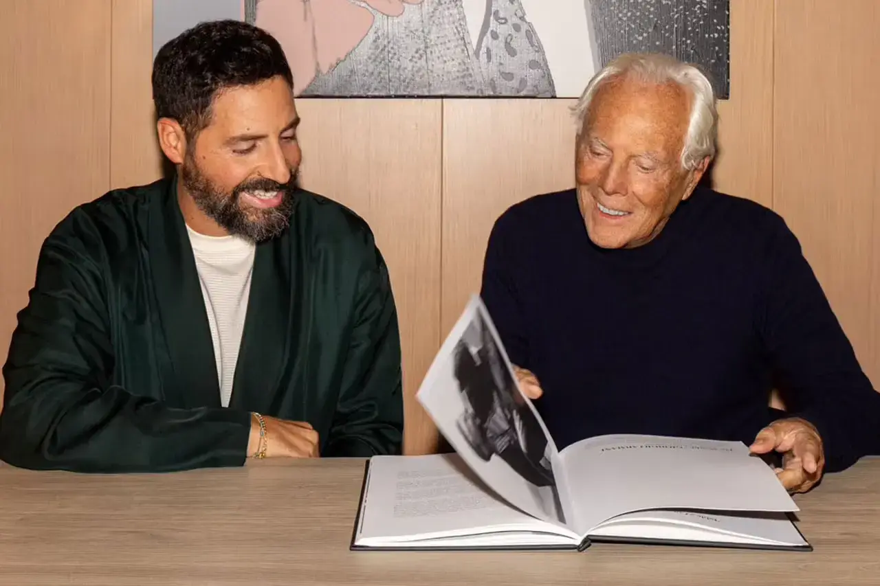 KITH founder Ronnie Fieg and Giorgio Armani collaborate on a groundbreaking fashion collection, merging streetwear with luxury design